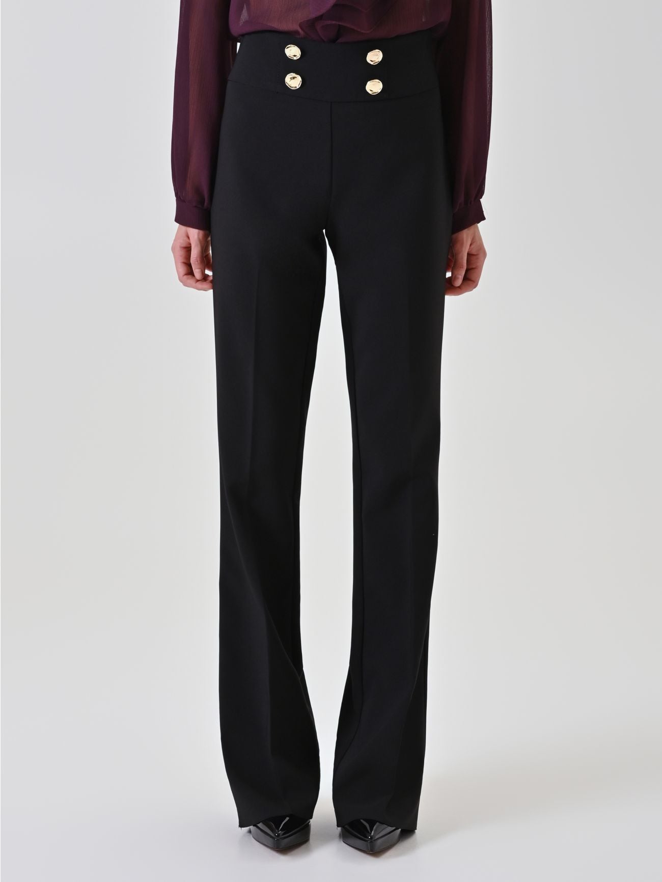 Rinascimento zwarte flared broek met gouden knopen